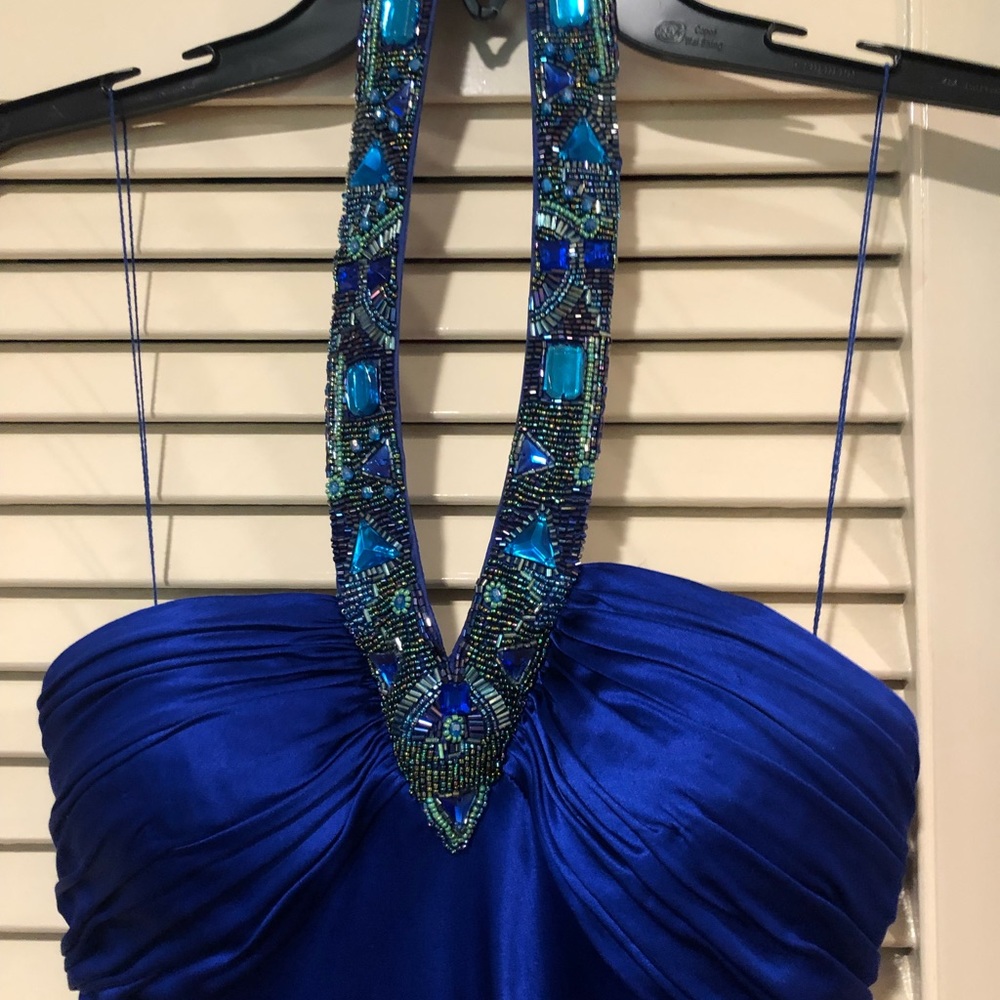 Gorgeous show stopping tea length or midi.